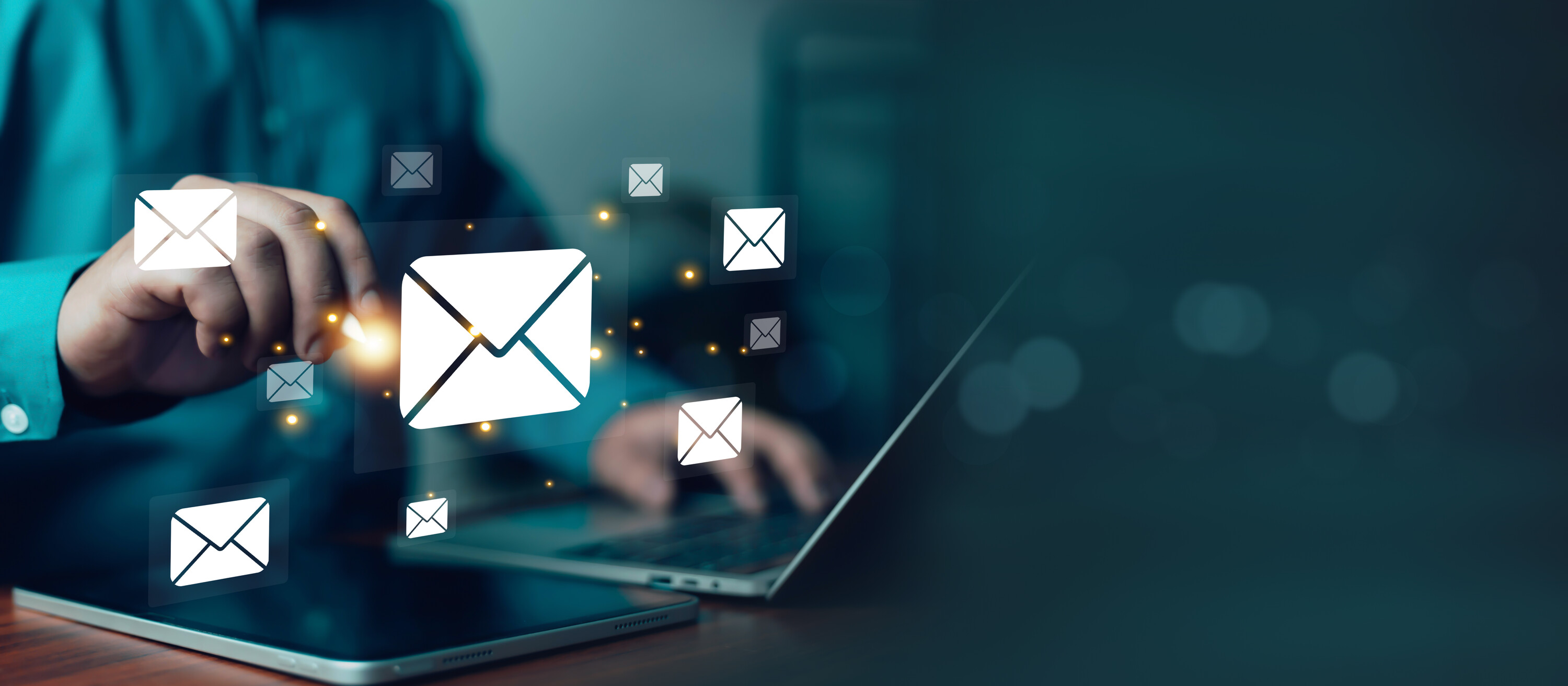 Business professional using digital email marketing interface on laptop and tablet, showcasing online communication, newsletter campaign, inbox management, customer support and modern technology
